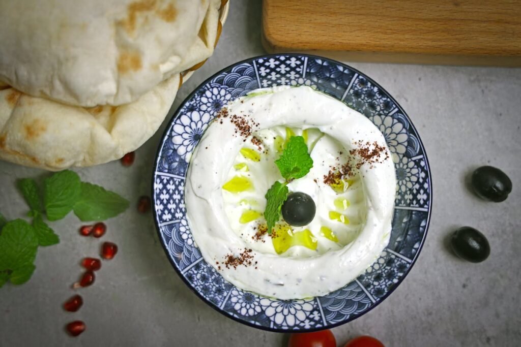 Labneh strained yoghurt cheese with olive oil and herbs