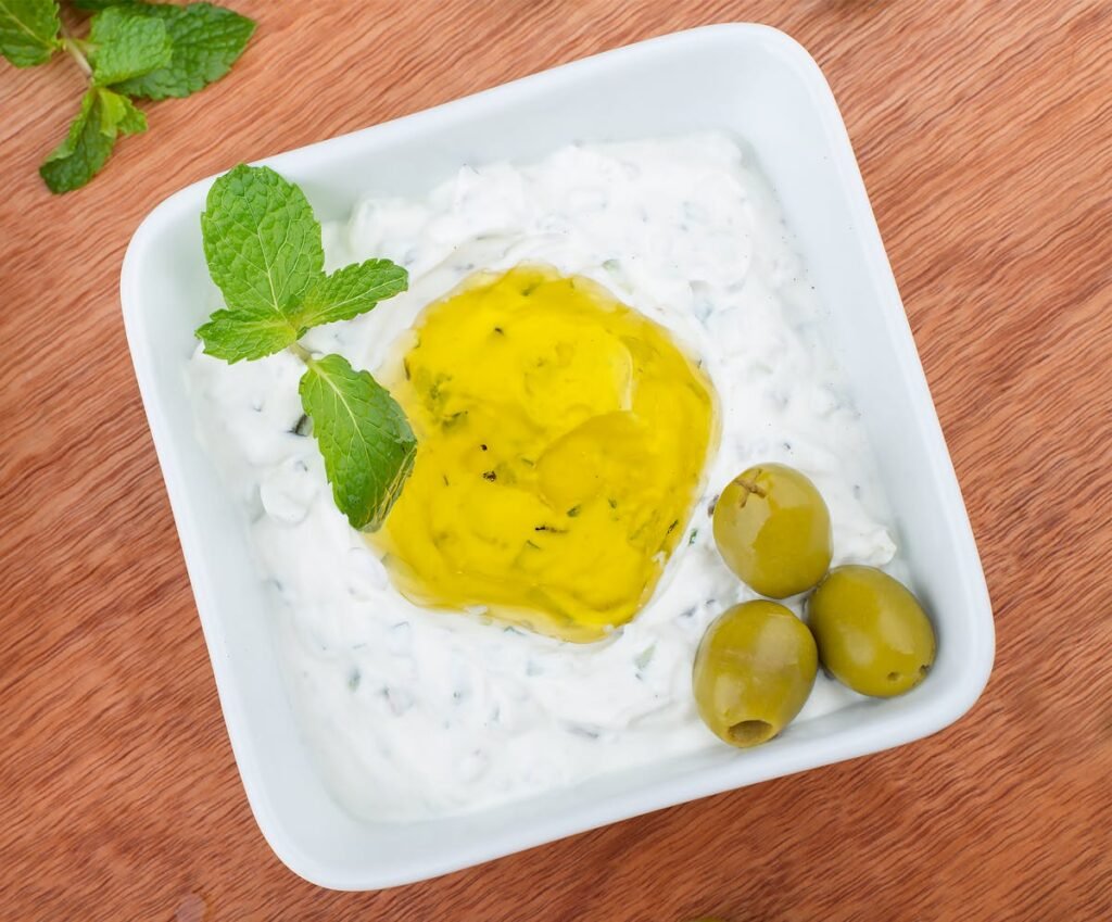 Greek tzatziki dip with olives and mint